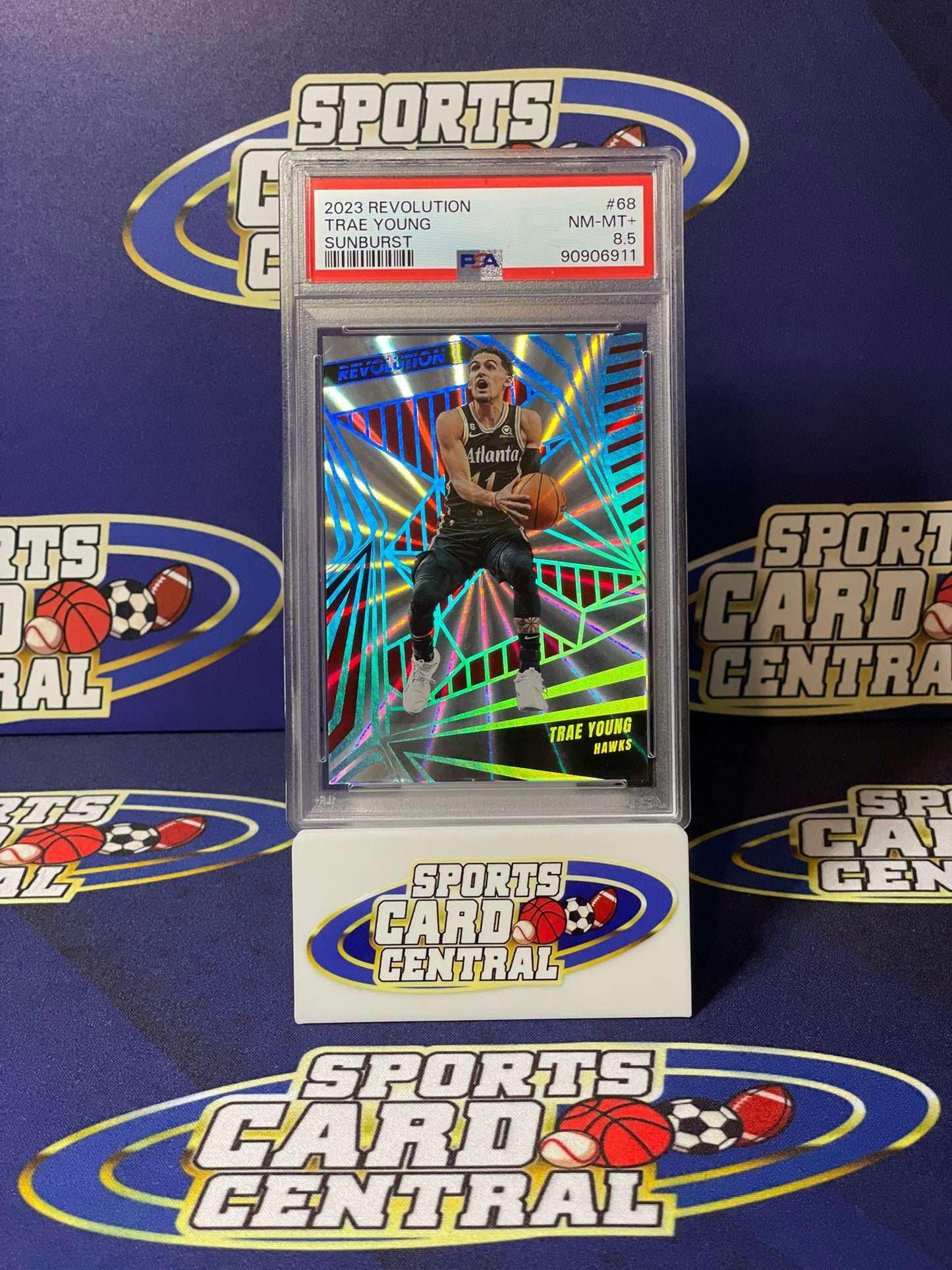 2023 Panini Revolution Trae Young Sunburst /75 PSA 8.5
